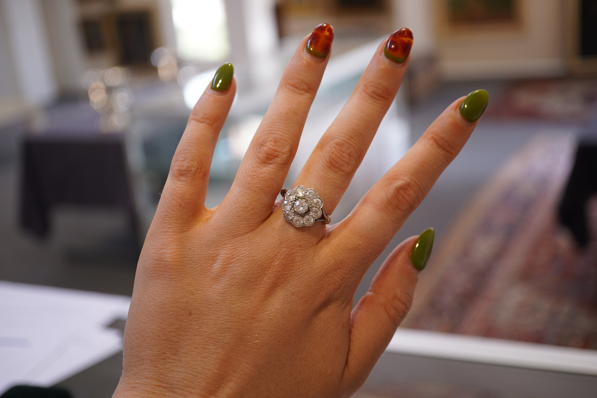 A diamond cluster ring, early 20th century